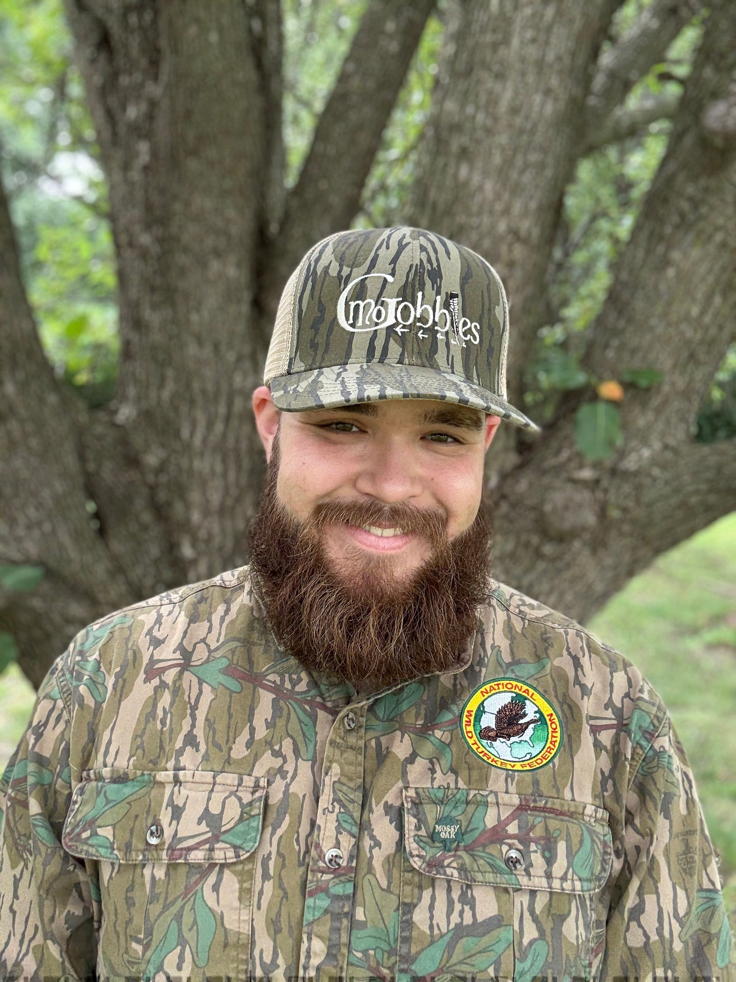 "MoGobbles" Formed Trucker Bottomland/Tan with Ivory Text.