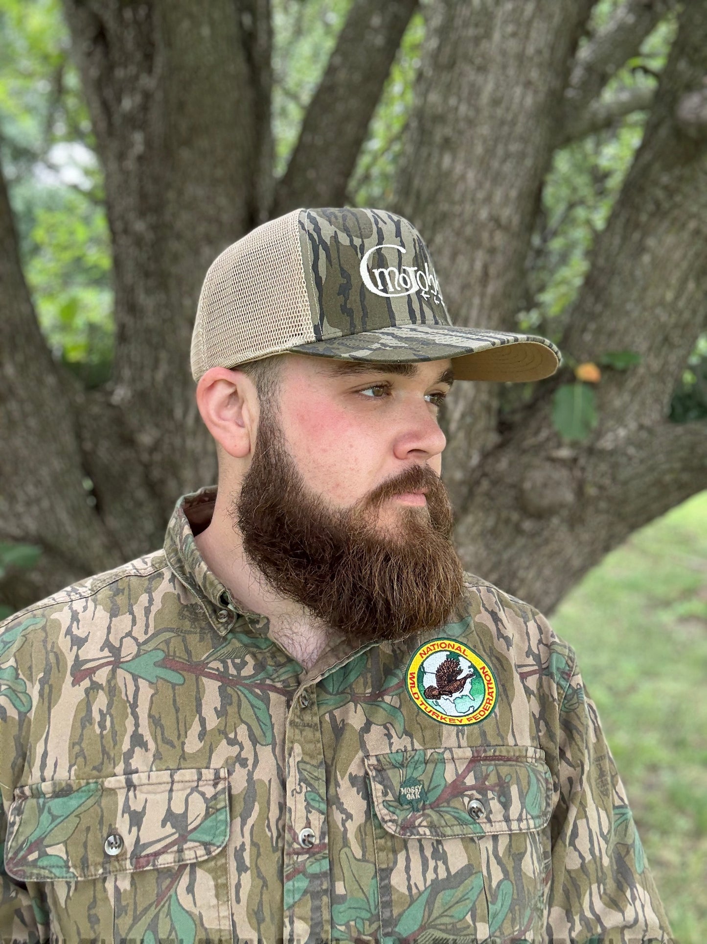 "MoGobbles" Formed Trucker Bottomland/Tan with Ivory Text.