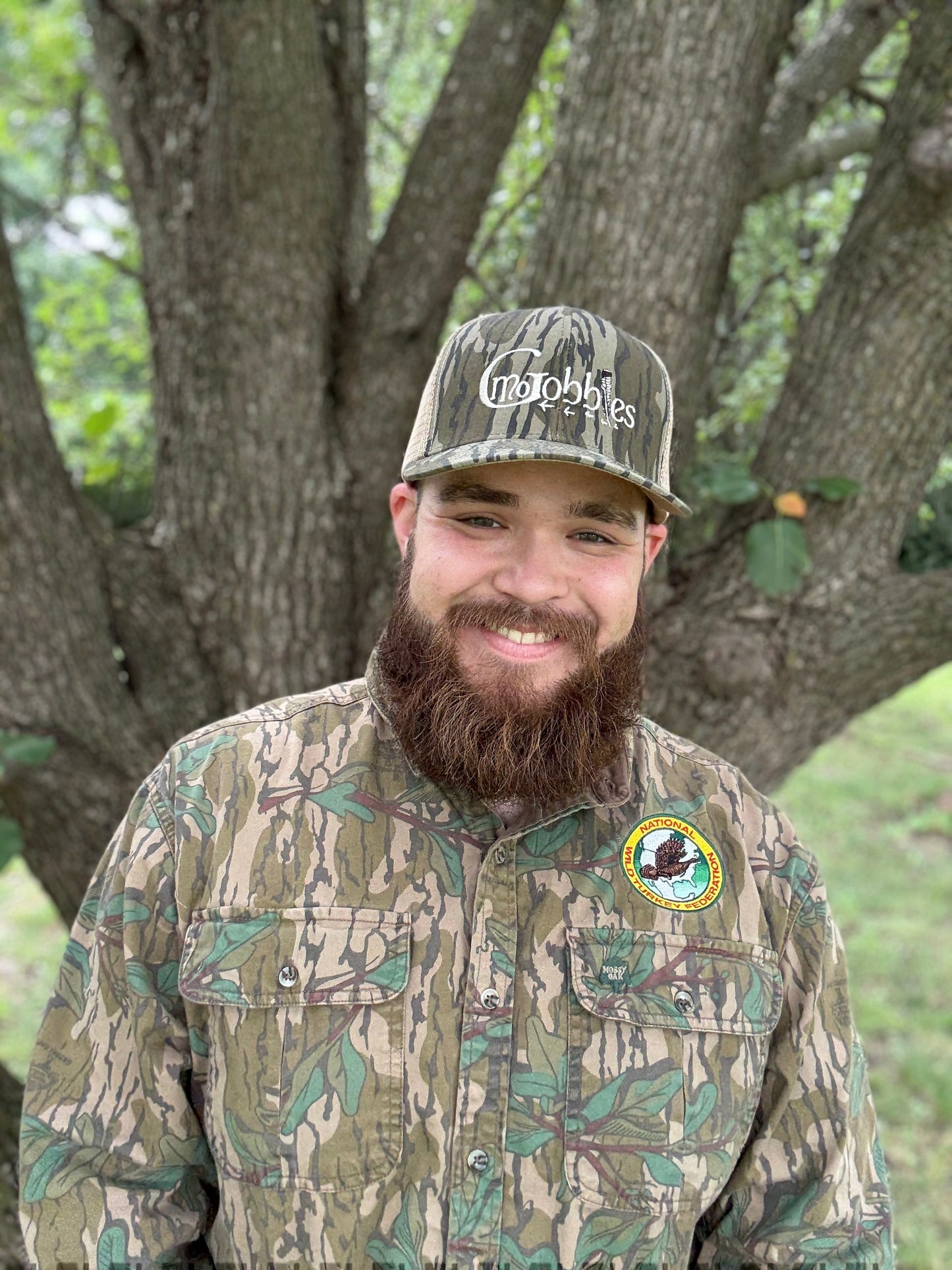 "MoGobbles" Formed Trucker Bottomland/Tan with Ivory Text.