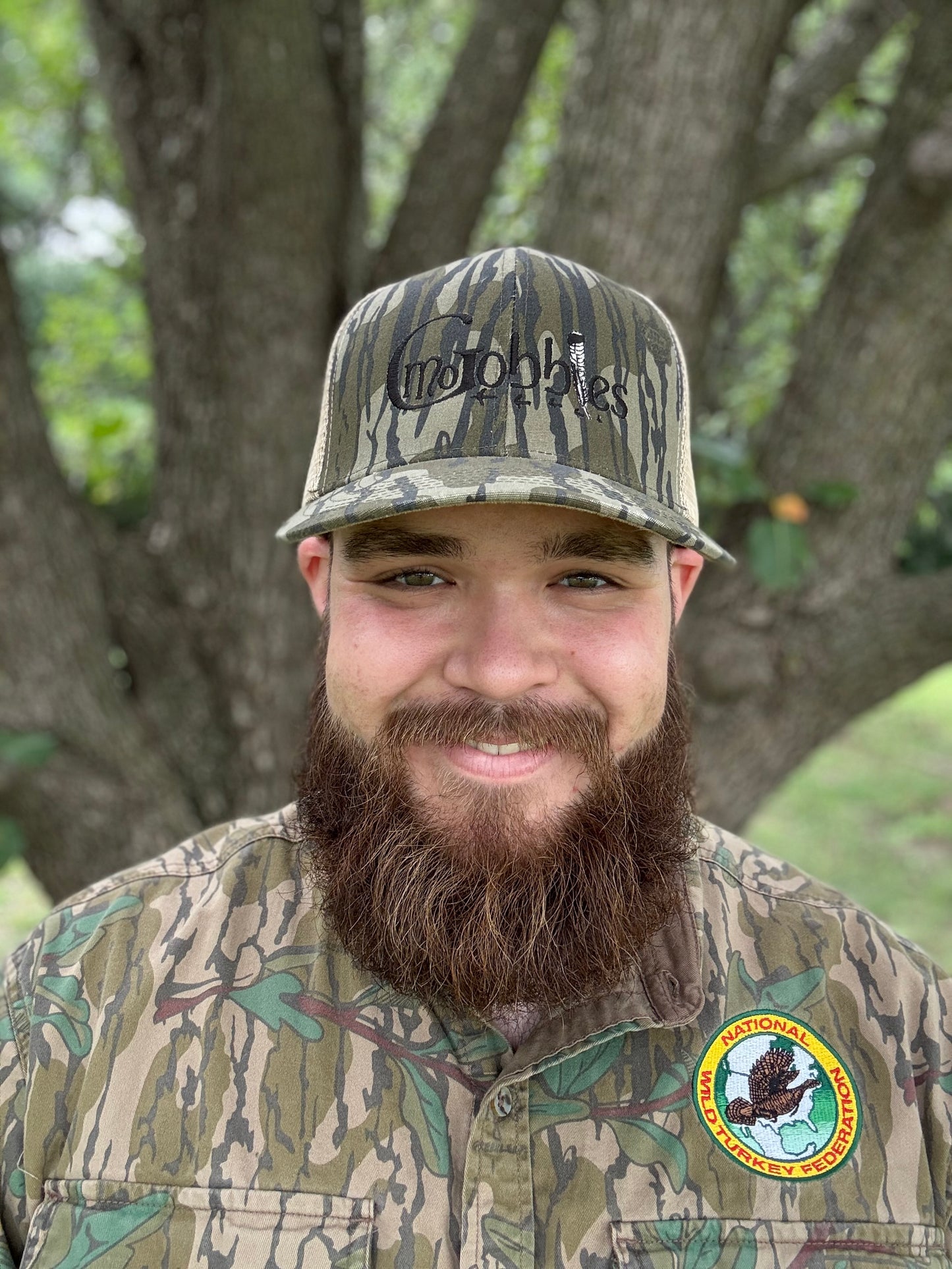 "MoGobbles" Formed Trucker Bottomland/Tan with Black Text.