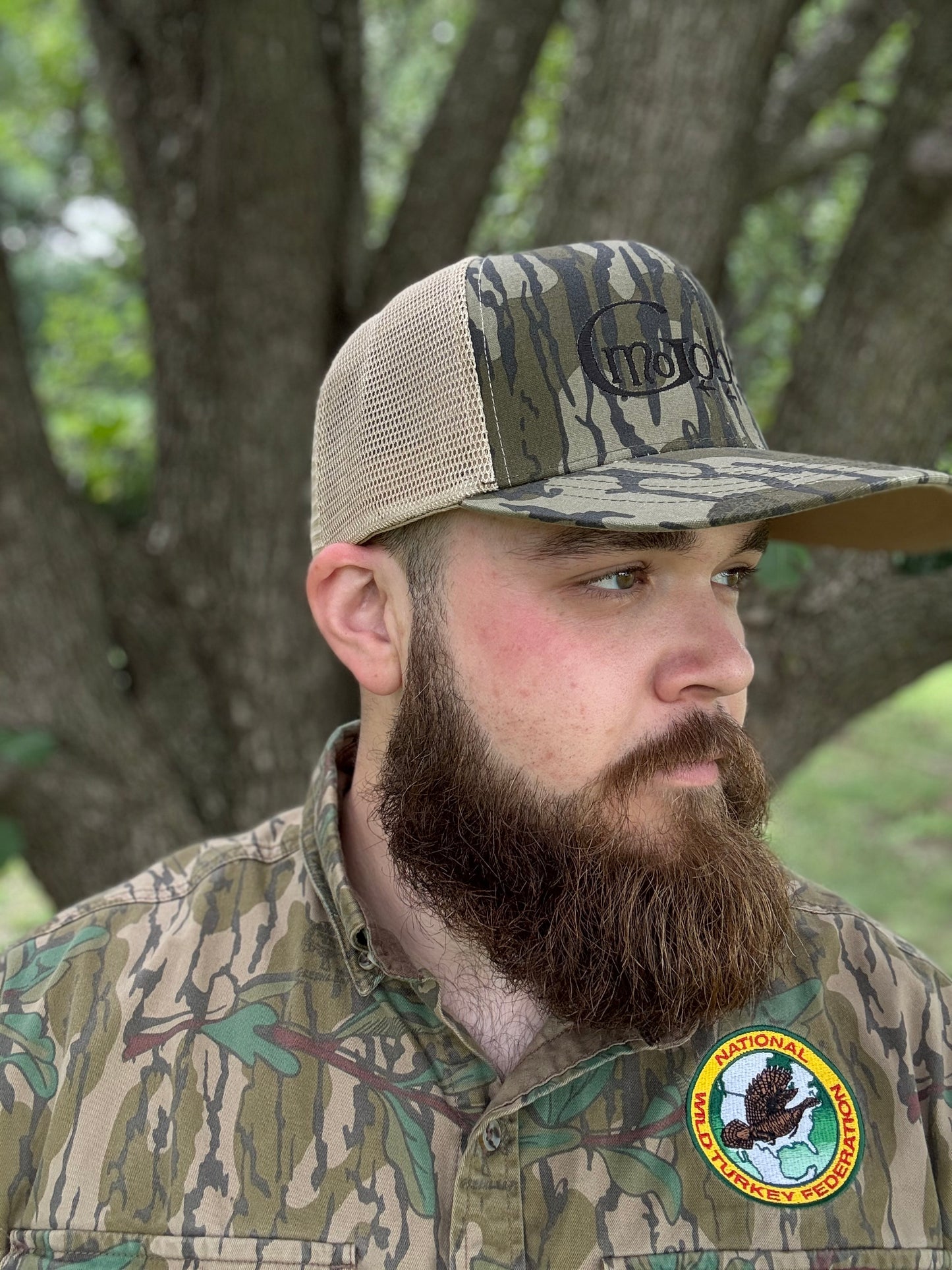 "MoGobbles" Formed Trucker Bottomland/Tan with Black Text.