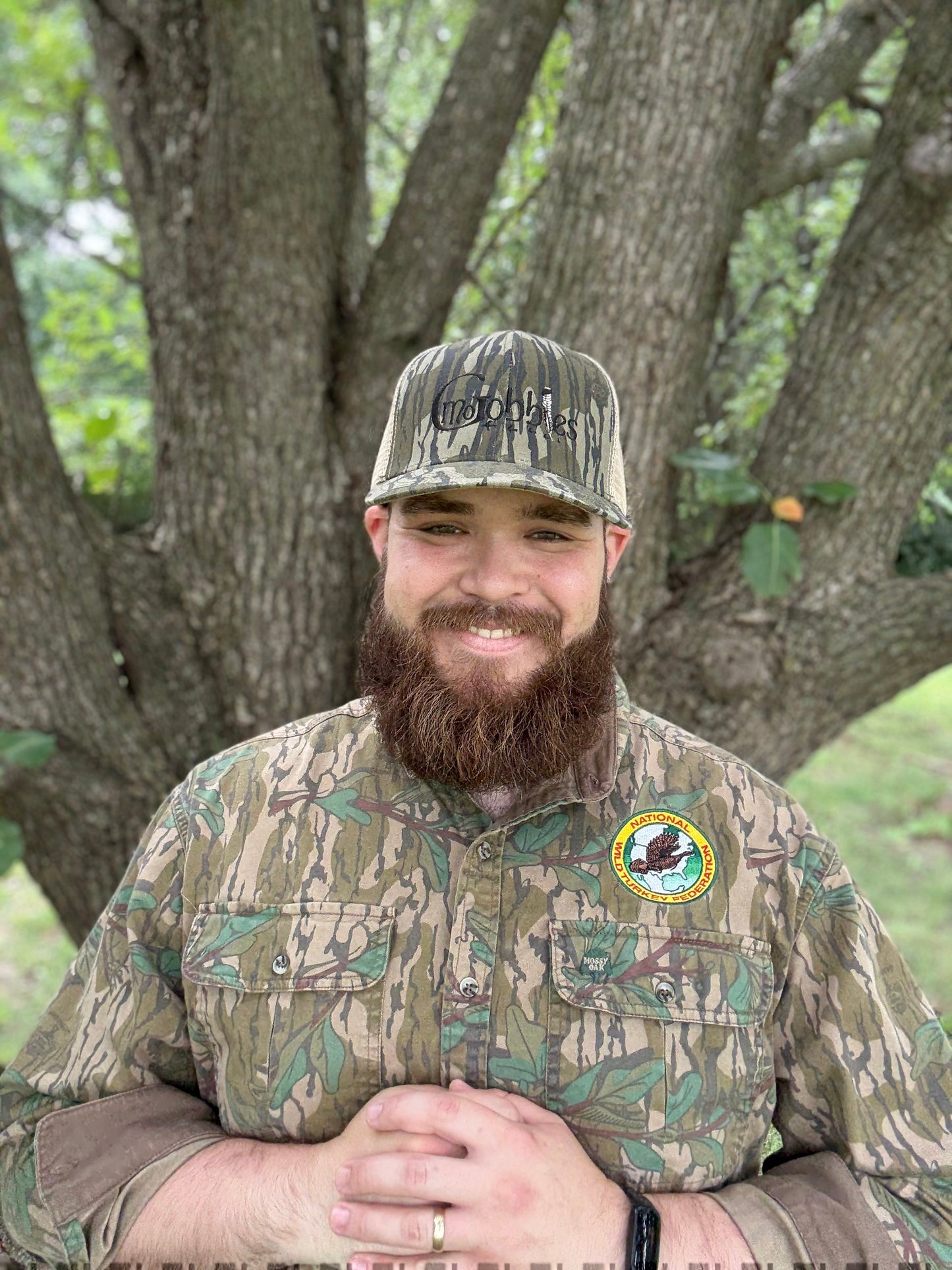 "MoGobbles" Formed Trucker Bottomland/Tan with Black Text.