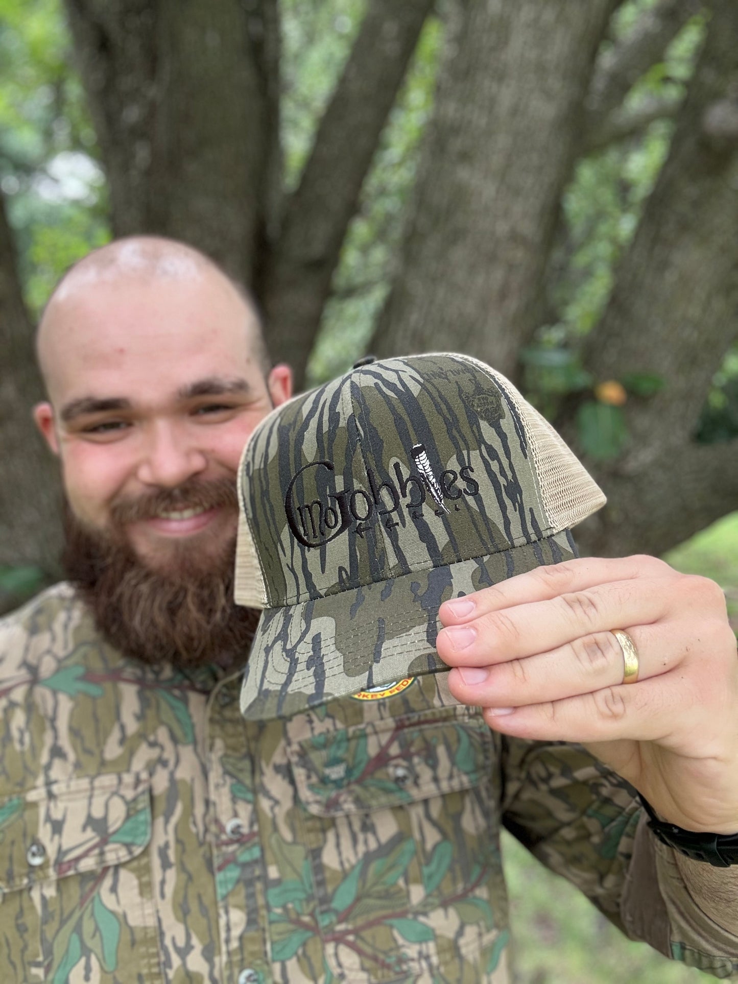 "MoGobbles" Formed Trucker Bottomland/Tan with Black Text.