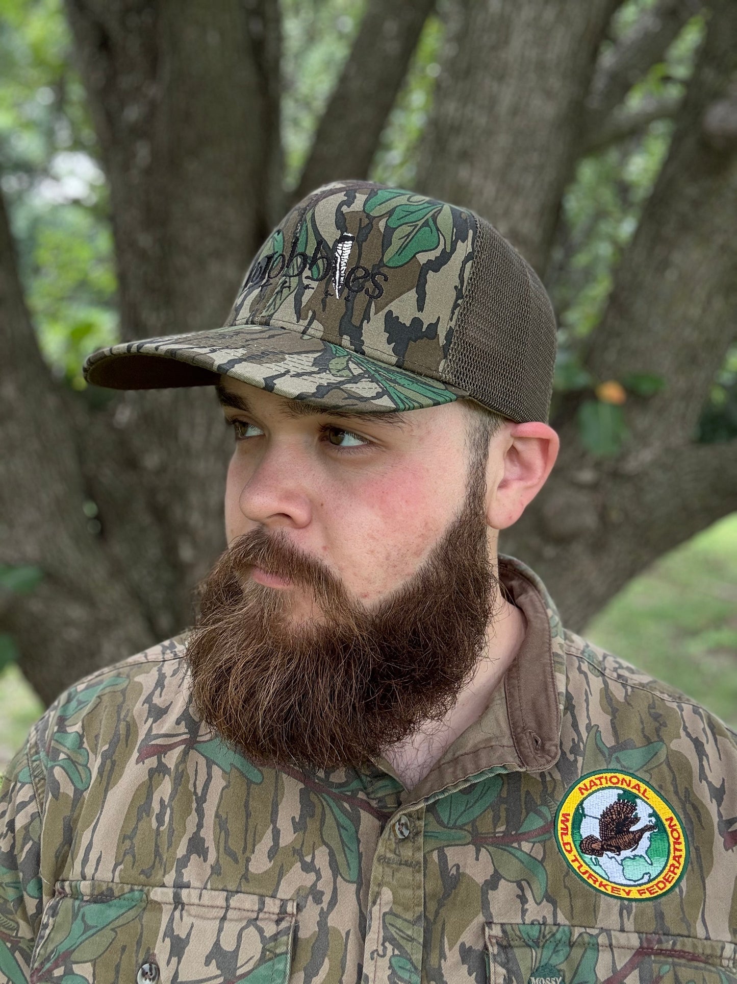 "MoGobbles" Formed Trucker Greenleaf/Olive with Black Text.