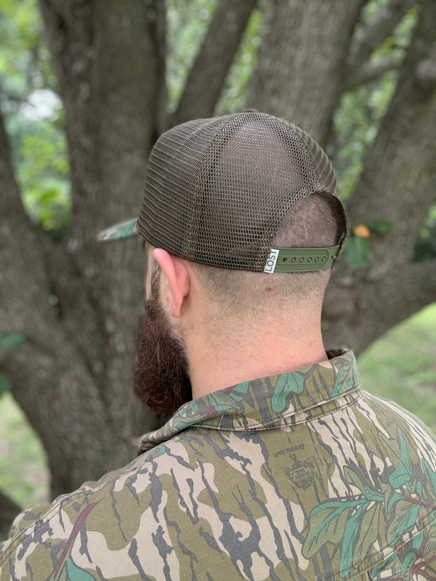 "MoGobbles" Formed Trucker Greenleaf/Olive with Black Text.